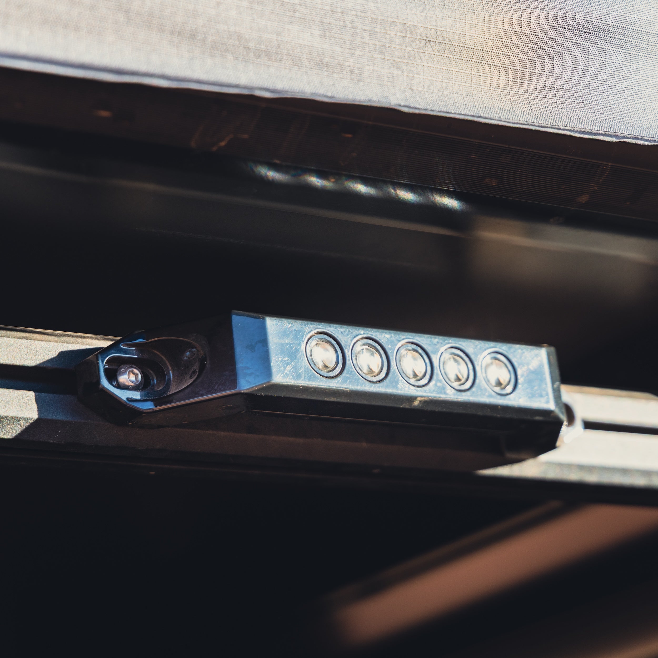 LED light bar on a vehicle with aluminum handle